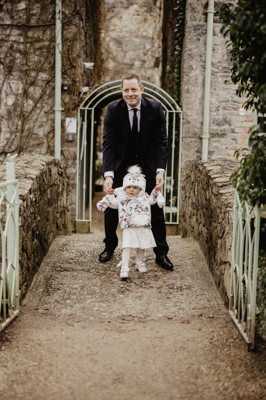 Father and Daughter portrait at Christening